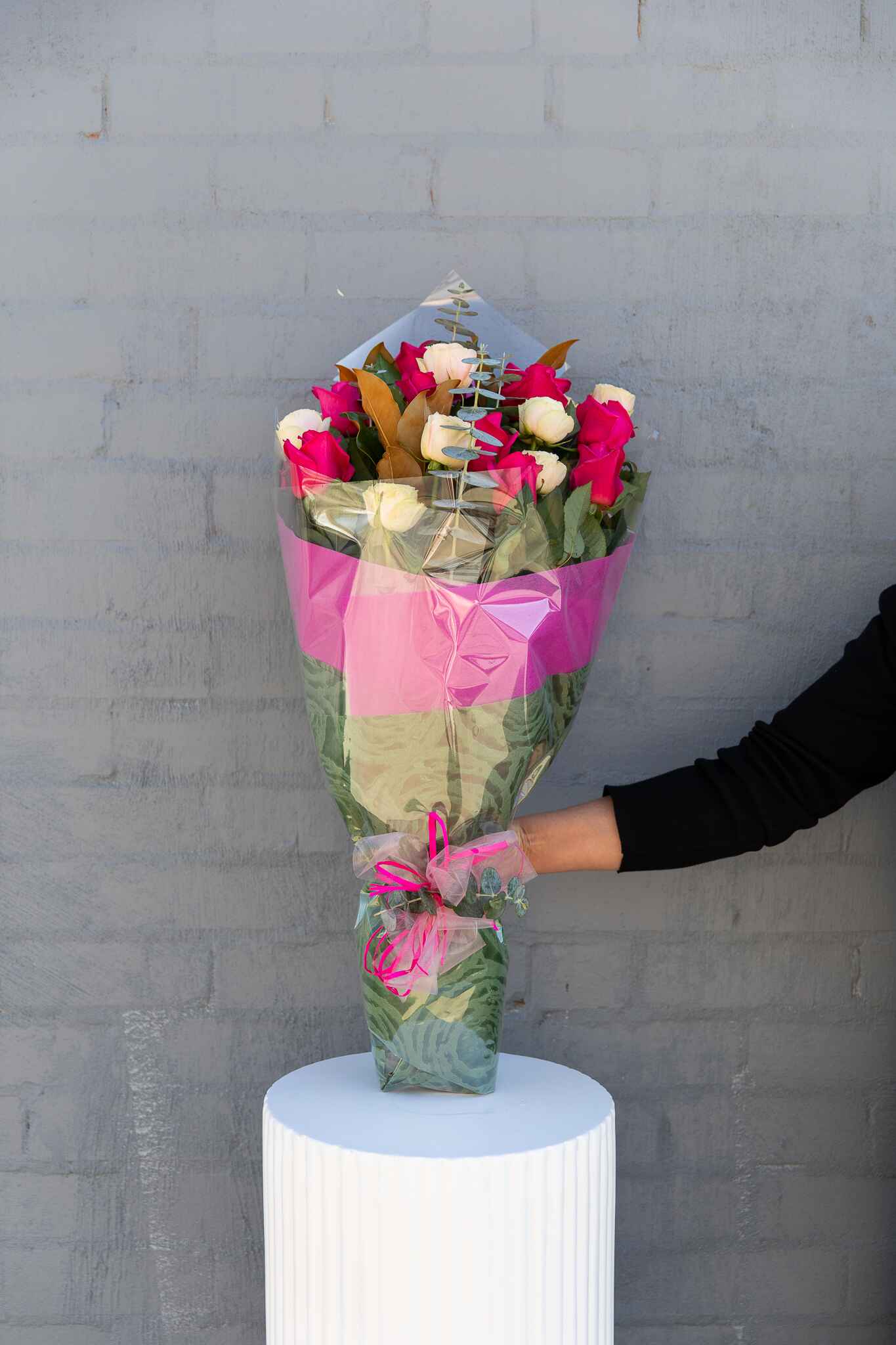 Wrapped in Roses Florist's Choice of Colour (floral arrangement available to purchase at Donvale Flower Gallery).